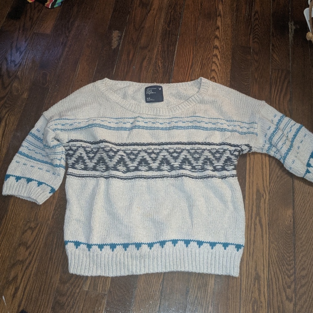 Quarter length sleeves sweater